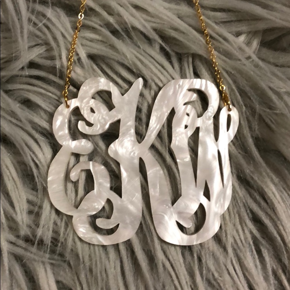 Shell Initial Necklace- the initials are EKW.